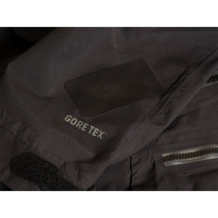 Black Rectangle Gear Aid Tenacious Tape GORE-TEX Fabric Patches used to repair a Tear in a Black GoreTex Jacket 