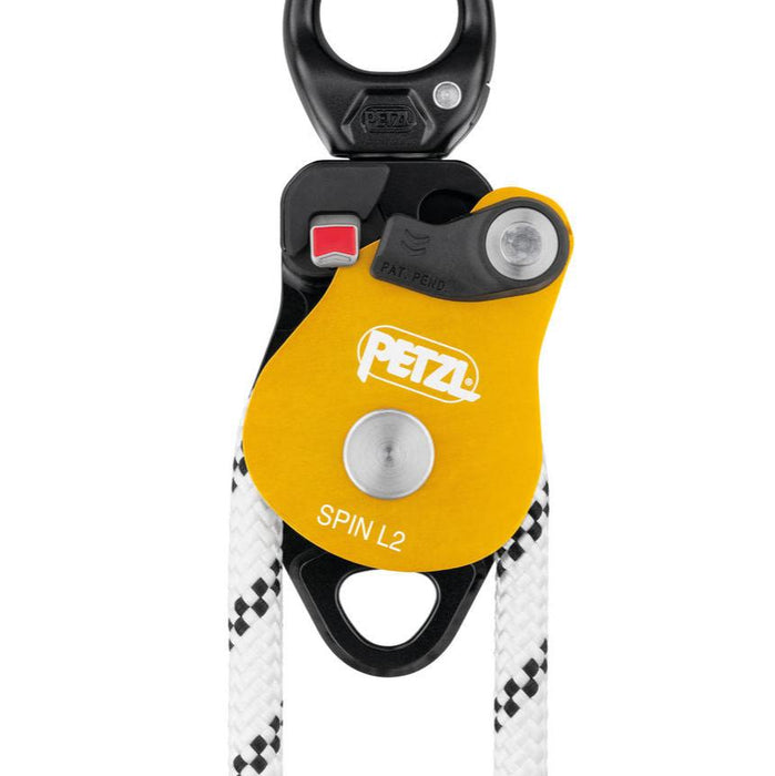 Petzl Spin L2 Double Pulley highlighting he red mark provides a visual warning when the moving side plate is unlocked.