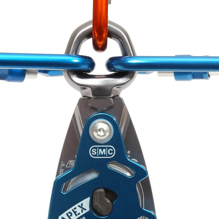 SMC Apex Swivel Pulley connected with three carabiners, showcasing its large swivel eye designed for multi-attachment configurations.