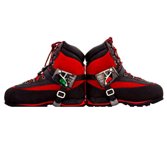 Pair of red and black climbing boots fitted with the ISC Stryder Right and Left Foot Ascenders, demonstrating secure attachment and functionality for rope climbing applications