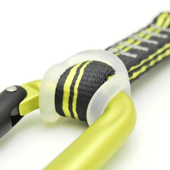 Close-up of a yellow carabiner, branded with "Kong", attached to a dark gray strap with white and yellow stitching. The strap is secured with a transparent rubber loop.