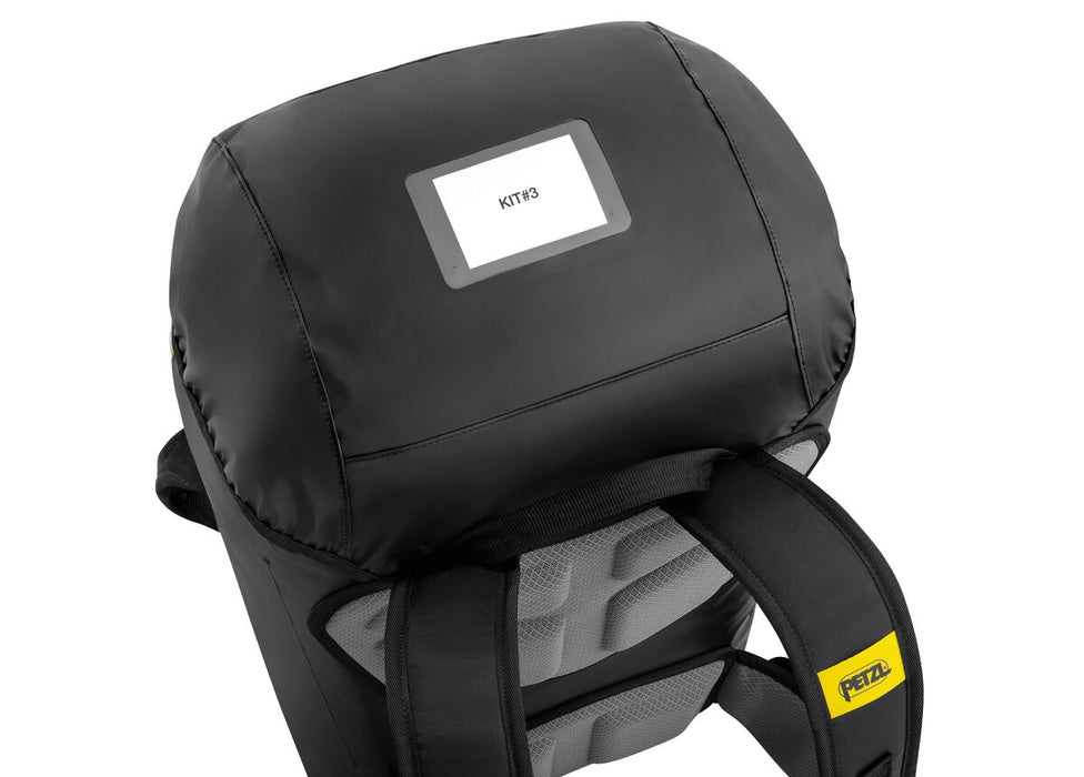 The upper flap on the Petzl Transport 60 backpack has a transparent pocket for
identification and a closed pocket for personal items or small equipment.