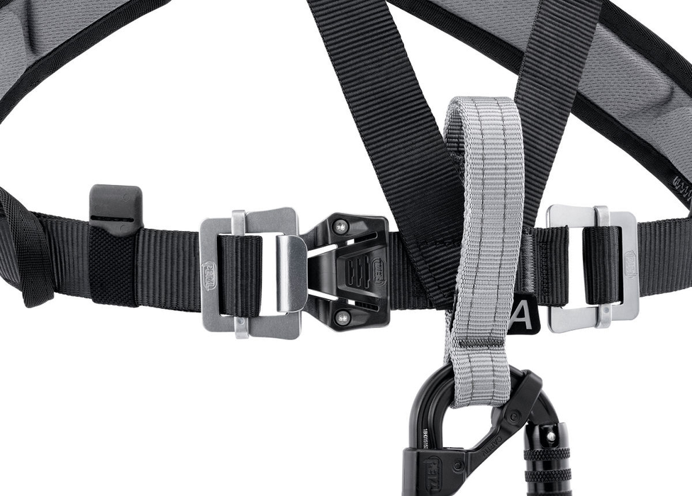 Petzl Chest Air Rescue Harness Close up to highlight product feature donning and removing the harness is quick and easy, even with thick clothing. with the FAST LT buckles at the chest.