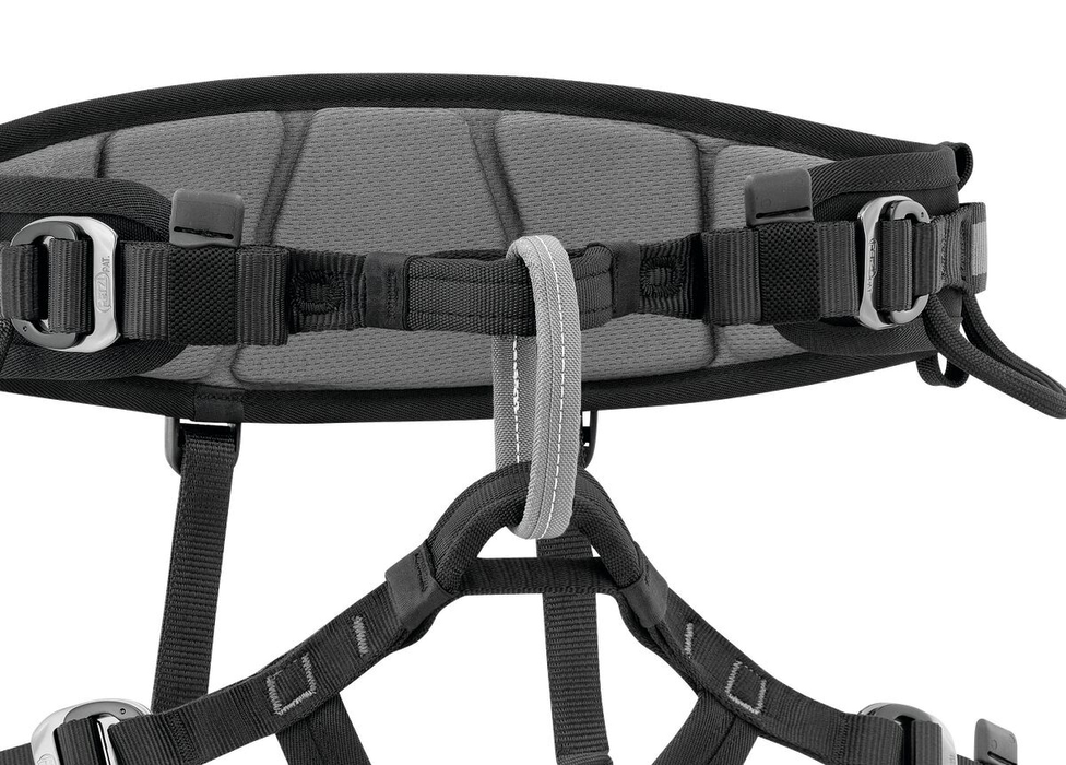 Petzl Falcon Mountain Rescue Harness close up showing Ventral attachment point with textile bridge favours progression with climbing techniques and makes for comfortable walking.